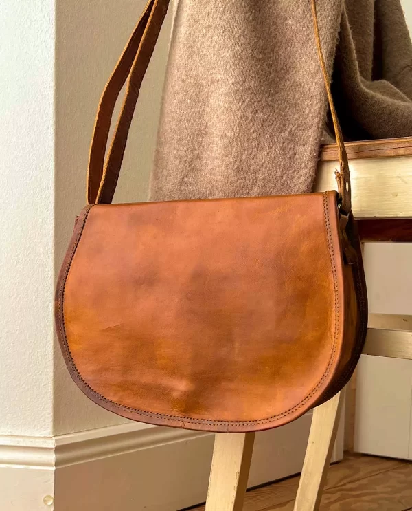 women leather sling bag